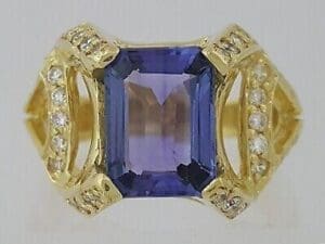 18K Yellow Gold 4.34 ct Natural Emerald Cut Tanzanite & Round Diamond Ring